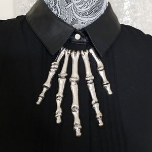 Skeletal hand necklace